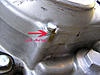 oil drip on bolt with arrows.jpg
